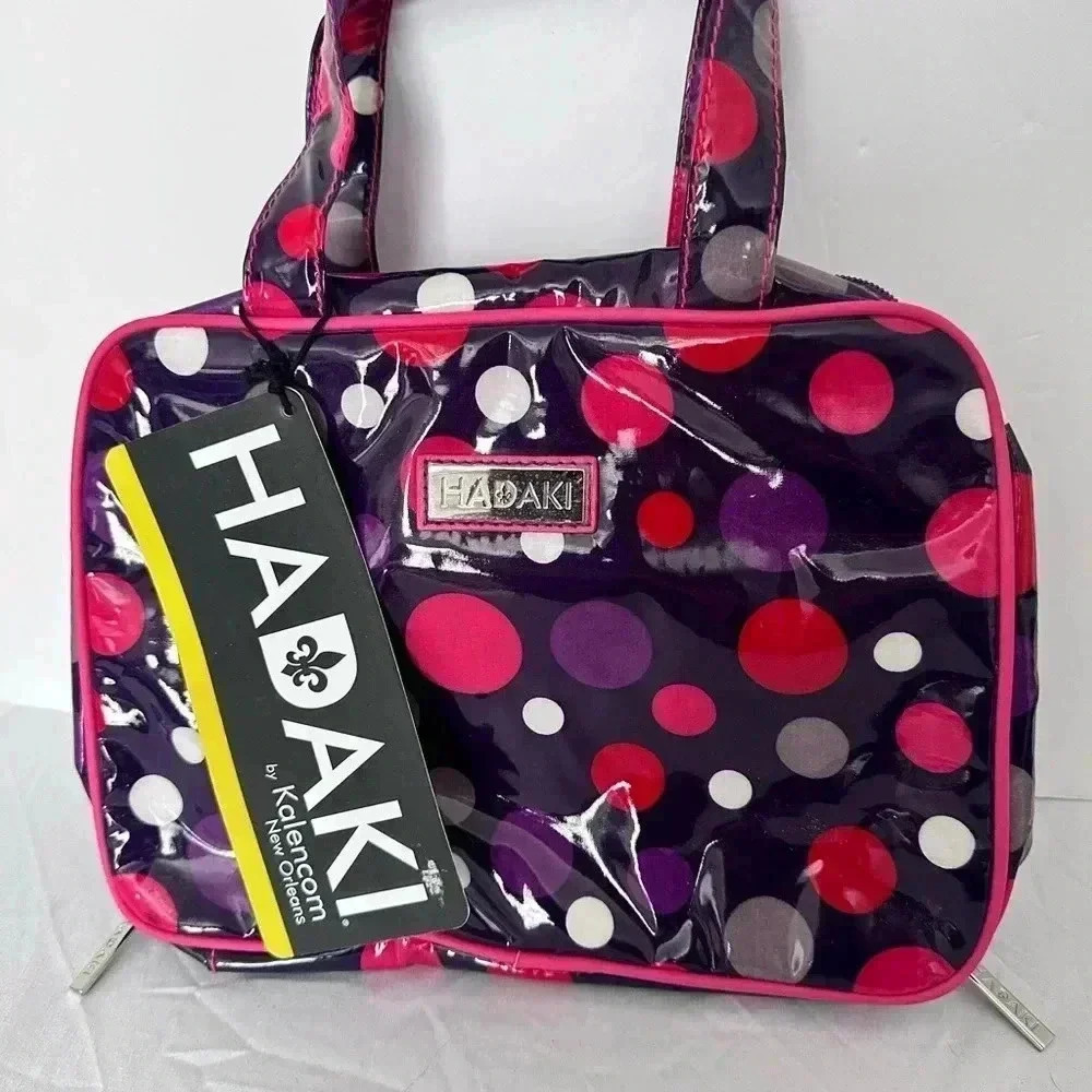 Hadaki Makeup case pod toiletry bag in bouncing ball berry.